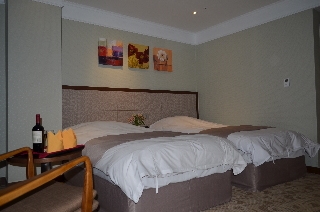 Imagen de la habitación del Hotel Robero Hotel Jeju. Foto 14