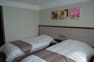 Imagen de la habitación del Hotel Robero Hotel Jeju. Foto 15
