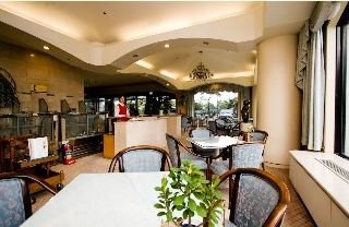Imagen del bar/restaurante del Hotel Robero Hotel Jeju. Foto 8
