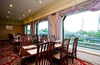 Imagen del bar/restaurante del Hotel Robero Hotel Jeju. Foto 9
