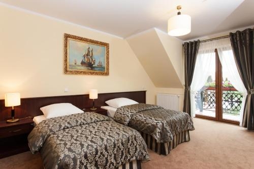 Imagen de la habitación del Hotel Robert's Port. Foto 6