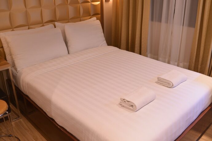 Imagen de la habitación del Hotel Robertson. Foto 19
