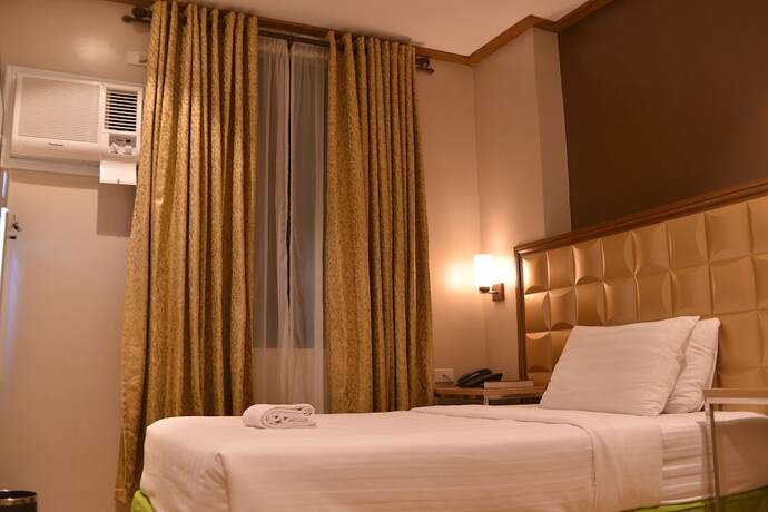 Imagen de la habitación del Hotel Robertson. Foto 22