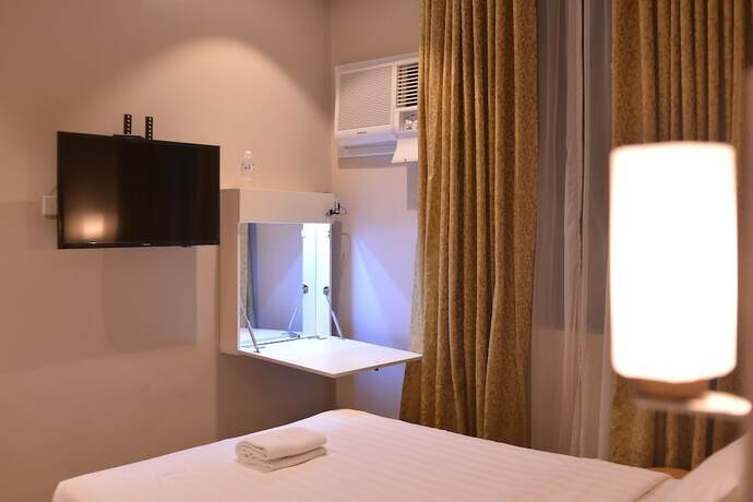Imagen de la habitación del Hotel Robertson. Foto 24