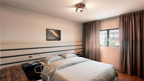 Imagen de la habitación del Hotel Robson, Lloret de Mar. Foto 5
