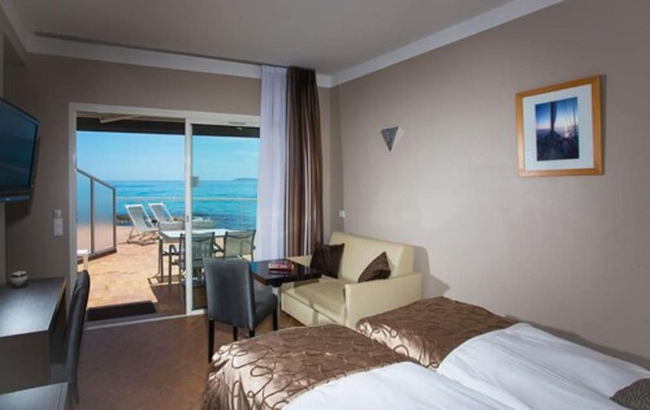 Imagen de la habitación del Hotel Roc. Foto 16
