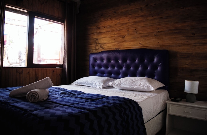 Imagen de la habitación del Hotel RocaMar Hostel Boutique. Foto 5