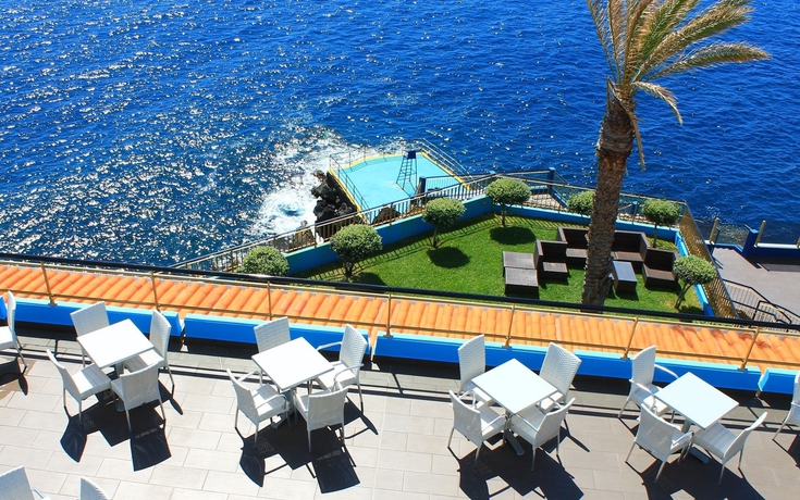 Imagen del bar/restaurante del Hotel Rocamar Lido Resort. Foto 5