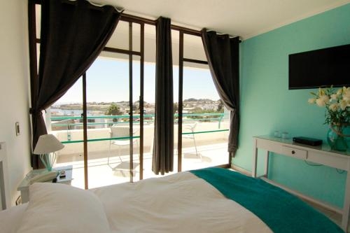 Imagen de la habitación del Hotel Rocas De Bah&iacute;a. Foto 6