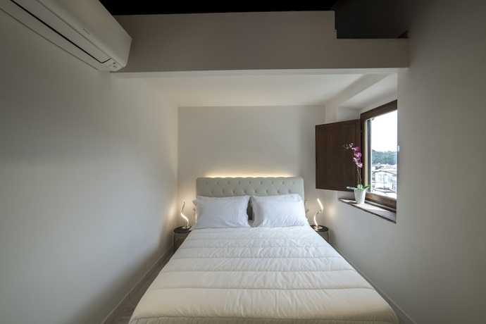 Imagen de la habitación del Hotel Rocca Palazzaccio. Foto 8