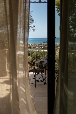 Imagen de la habitación del Hotel RoccaSeta dimore siciliane. Foto 16