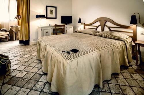 Imagen de la habitación del Hotel Roccamare Resort - Casa Di Levante. Foto 10