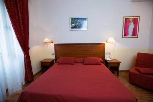 Imagen de la habitación del Hotel Roccaporena & La Margherita. Foto 3