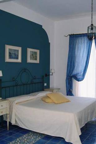 Imagen de la habitación del Hotel Rocce Azzurre. Foto 16