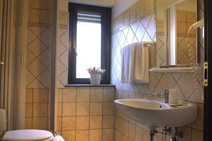 Imagen de la habitación del Hotel Rocchi. Foto 7