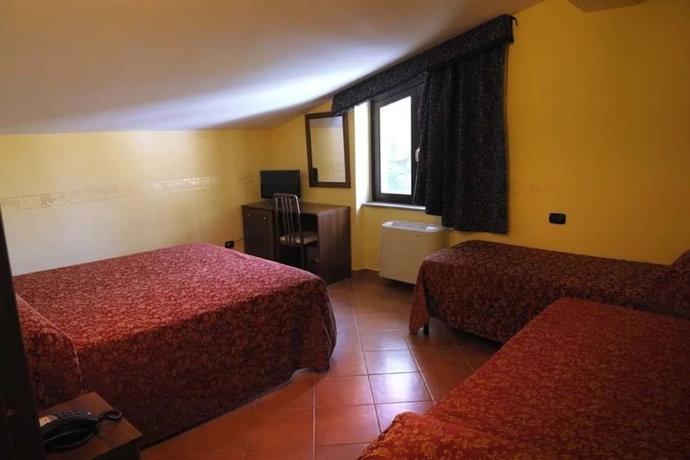 Imagen de la habitación del Hotel Rocchi. Foto 8