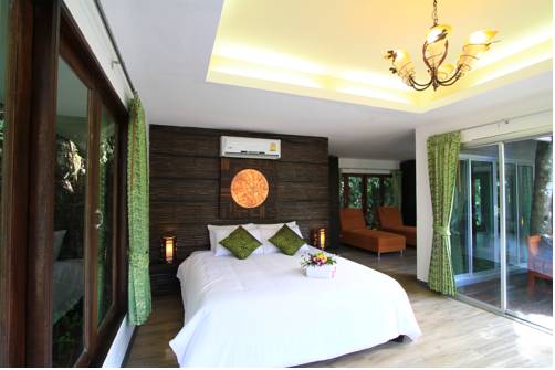 Imagen de la habitación del Hotel Rock And Tree House Resort. Foto 9
