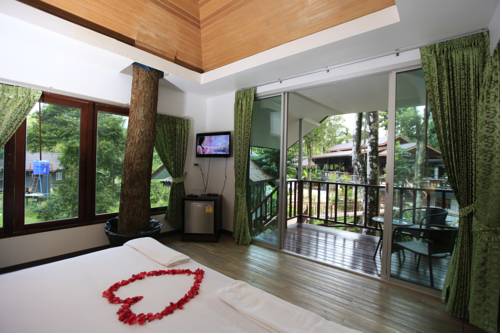 Imagen de la habitación del Hotel Rock And Tree House Resort. Foto 10