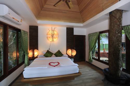 Imagen de la habitación del Hotel Rock And Tree House Resort. Foto 12