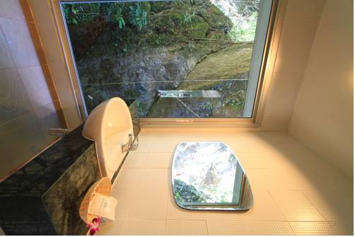 Imagen de la habitación del Hotel Rock And Tree House Resort. Foto 15