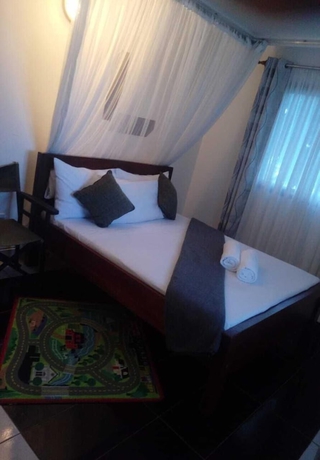 Imagen de la habitación del Hotel Rock Galana Holiday Apartments. Foto 3