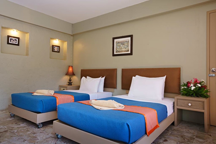 Imagen de la habitación del Hotel Rock Garden Beach Resort. Foto 7