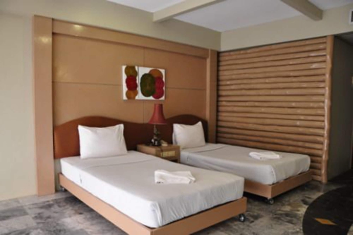 Imagen de la habitación del Hotel Rock Garden Beach Resort. Foto 8