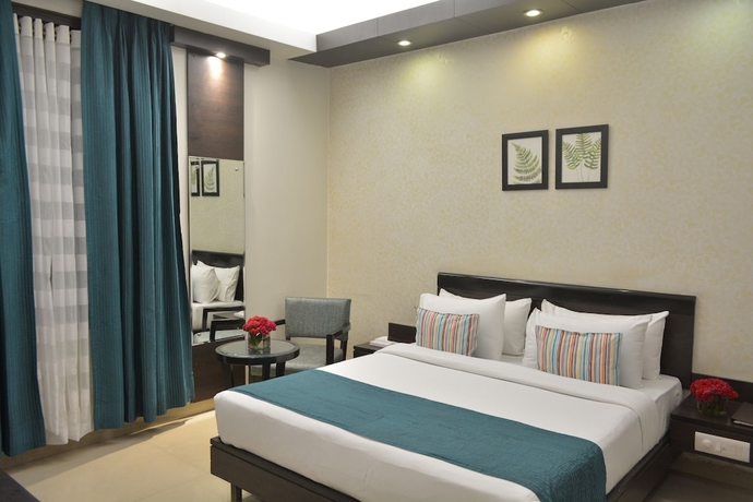 Imagen de la habitación del Hotel Rockland Panchsheel Enclave. Foto 5