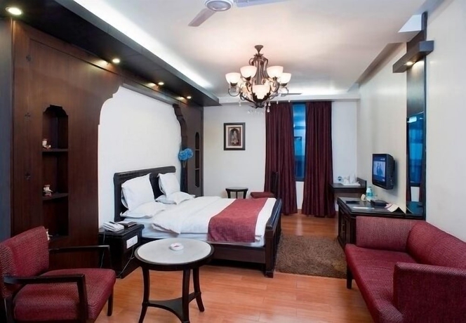 Imagen de la habitación del Hotel Rockland Panchsheel Enclave. Foto 7