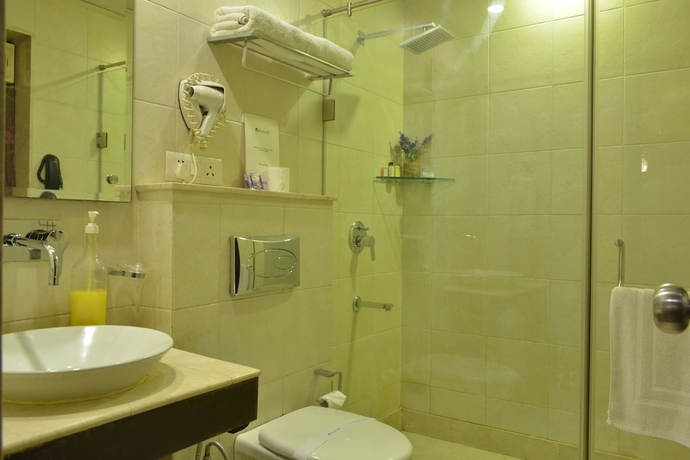 Imagen de la habitación del Hotel Rockland Panchsheel Enclave. Foto 10