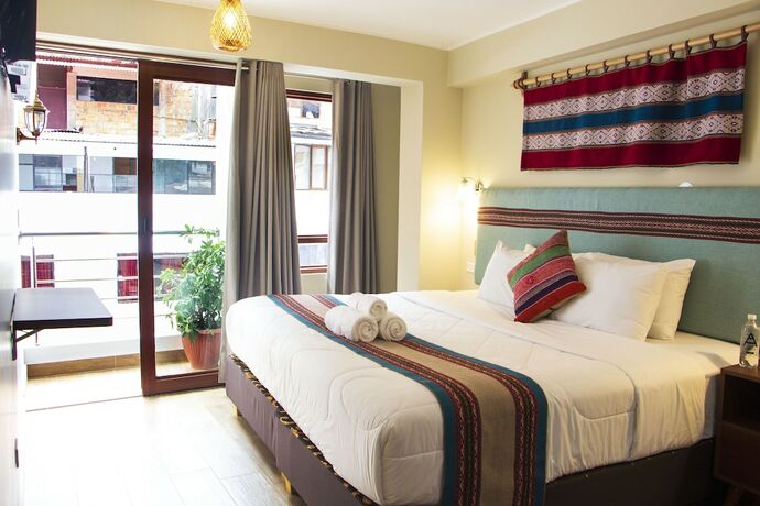 Imagen de la habitación del Hotel Rockrivers Machu Picchu. Foto 15