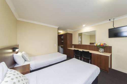 Imagen de la habitación del Hotel Rocky Resort Motor Inn. Foto 3