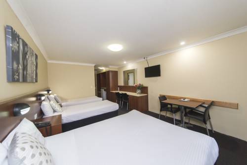 Imagen de la habitación del Hotel Rocky Resort Motor Inn. Foto 5