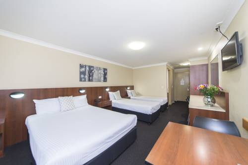 Imagen de la habitación del Hotel Rocky Resort Motor Inn. Foto 6