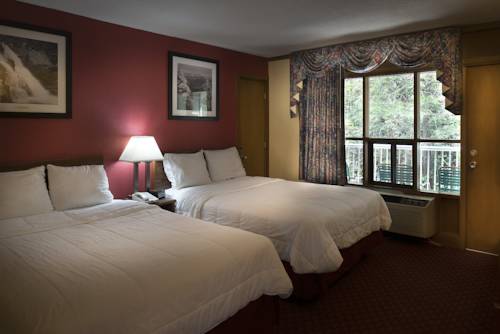 Imagen de la habitación del Hotel Rocky Waters Motor Inn. Foto 9