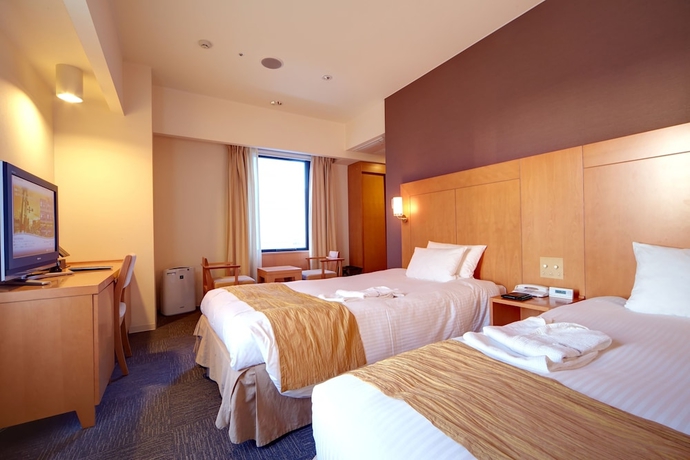 Imagen de la habitación del Hotel Rocore Naha. Foto 17