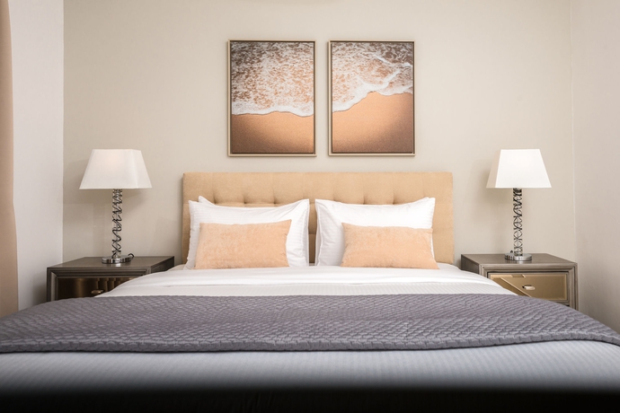 Imagen de la habitación del Hotel Roda Boutique Villas. Foto 6