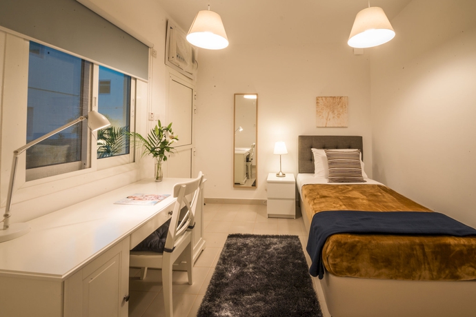 Imagen de la habitación del Hotel Roda Boutique Villas. Foto 9