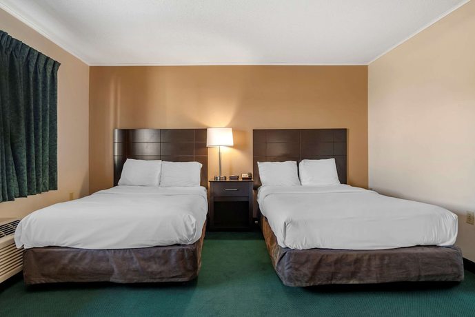 Imagen de la habitación del Hotel Rodeway Inn And Suites, Camelot Mobile Home Park. Foto 5