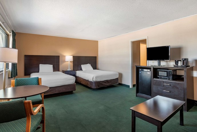 Imagen de la habitación del Hotel Rodeway Inn And Suites, Camelot Mobile Home Park. Foto 8