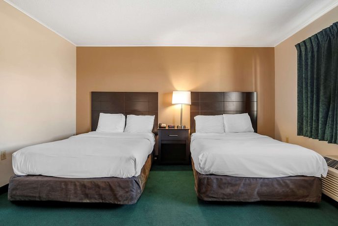 Imagen de la habitación del Hotel Rodeway Inn And Suites, Camelot Mobile Home Park. Foto 11