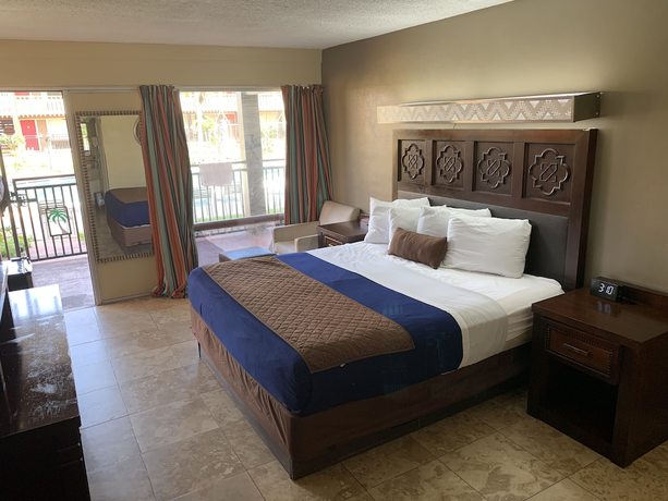 Imagen de la habitación del Hotel Rodeway Inn, Holiday. Foto 7