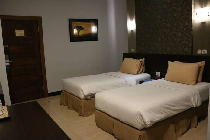 Imagen de la habitación del Hotel Roditha Banjarbaru. Foto 20