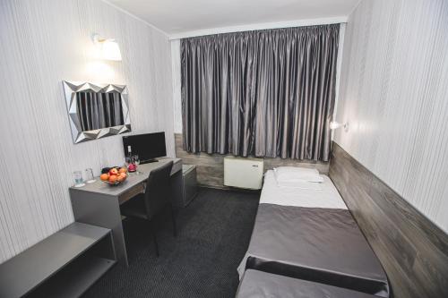 Imagen de la habitación del Hotel Rodopi, Haskovo. Foto 17