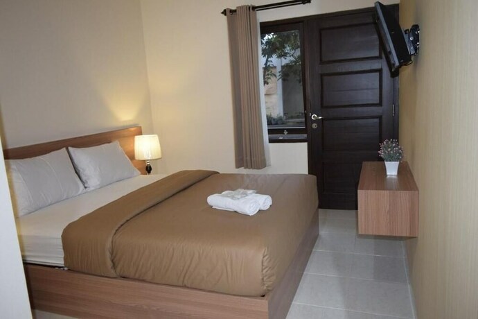 Imagen de la habitación del Hotel Roemah Canting. Foto 15