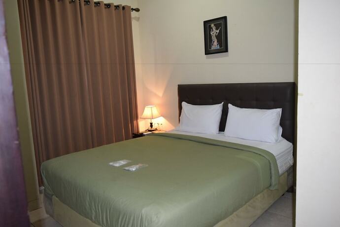 Imagen de la habitación del Hotel Roemah Canting. Foto 17