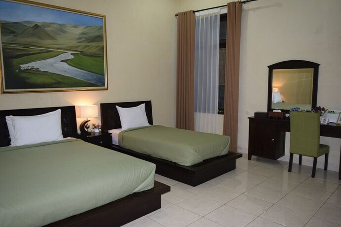 Imagen de la habitación del Hotel Roemah Canting. Foto 21