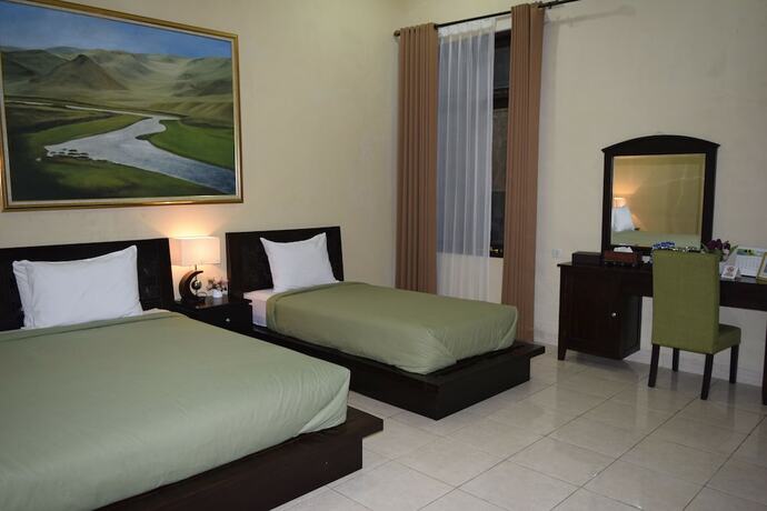 Imagen de la habitación del Hotel Roemah Canting. Foto 22