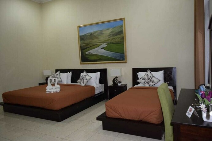 Imagen de la habitación del Hotel Roemah Canting. Foto 23