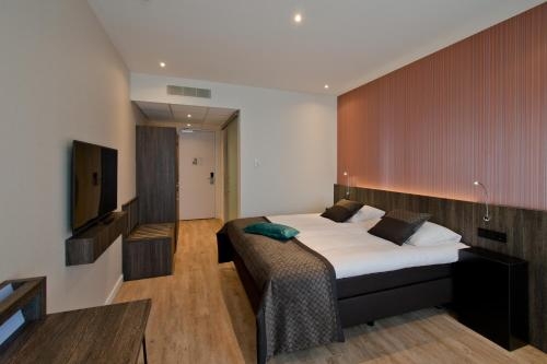 Imagen de la habitación del Hotel Roermond. Foto 10
